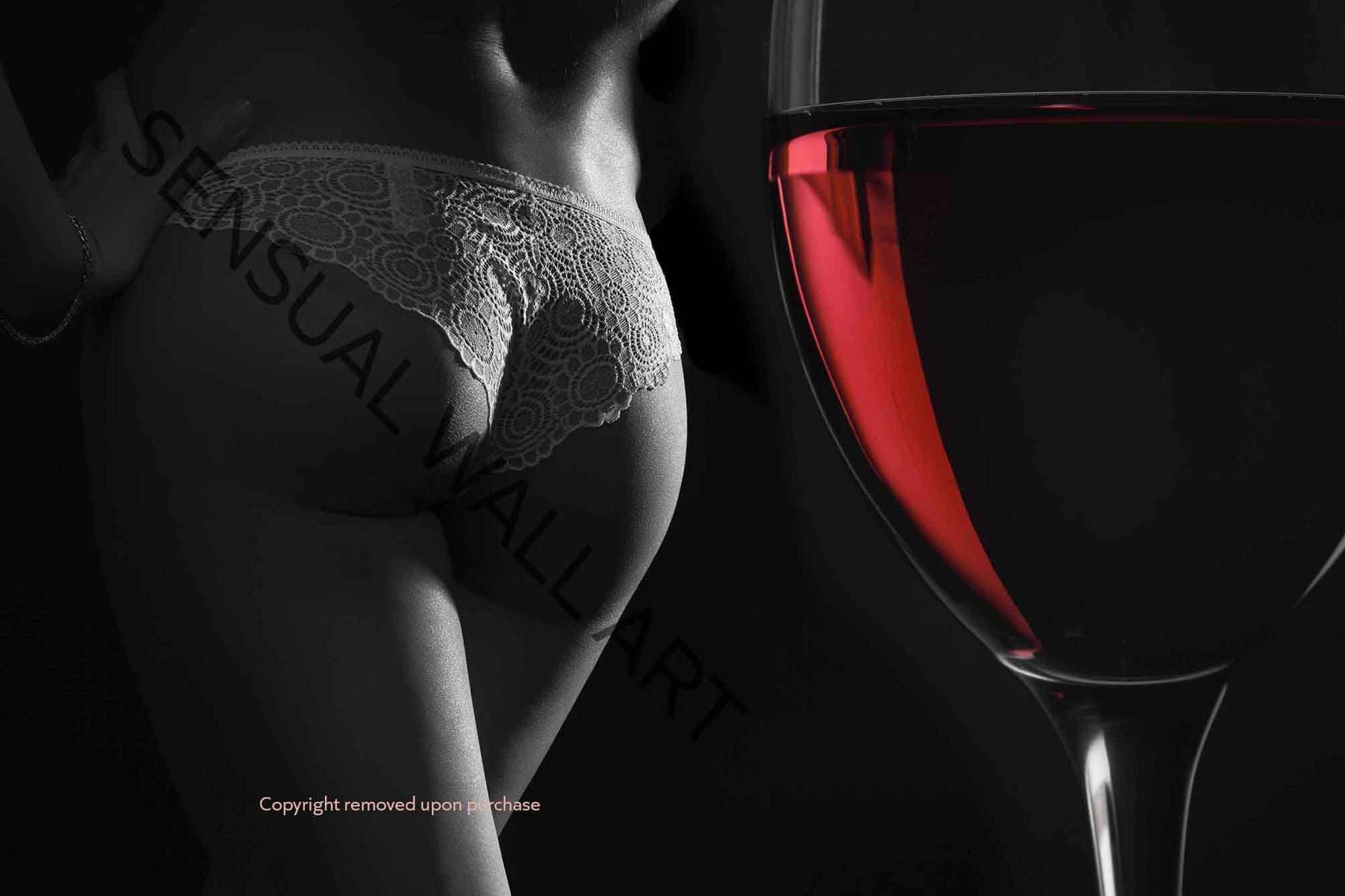 Womans beautiful derriere  and a glass of red wine
