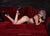 silver hair young woman in lingerie lying on red couch poster